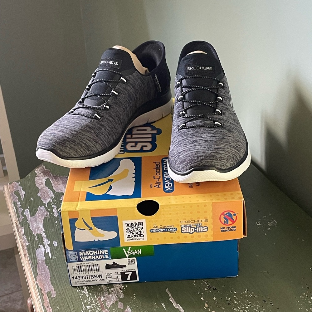 Skechers Black and White Slip-On Shoes